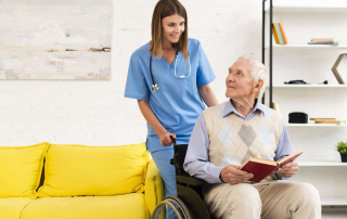 old man sitting wheelchair while talking nurse | Harborview Rehab & Care